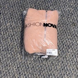 Cute Sherpa pullover jacket.